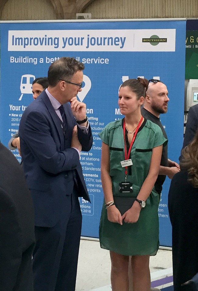 Charles Horton, CEO of Govia Thameslink, which runs Southern Rail, speaks to customers at Victoria station, spoke with angry customers at a 'meet the manager' event. 