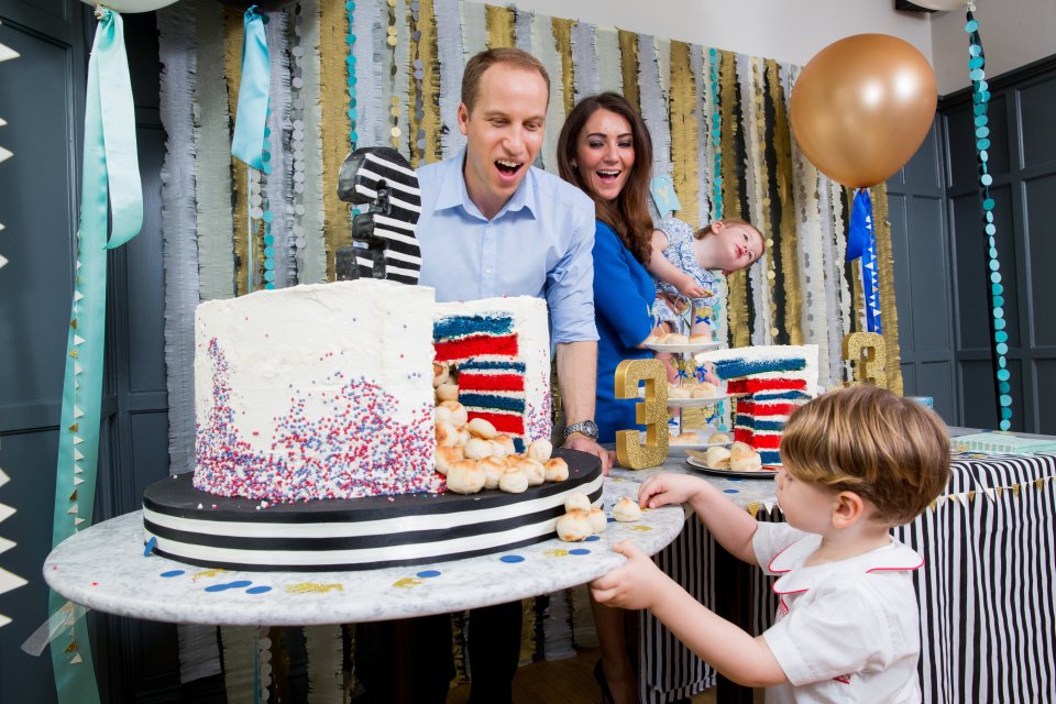 The regal lookalikes looked impressed by the young prince's birthday cake