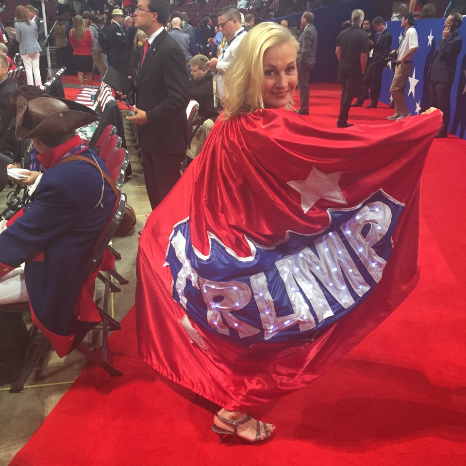 Mary Susan from Minnesota wore a a red Trump cape made by a 'legal Mexican immigrant' friend 