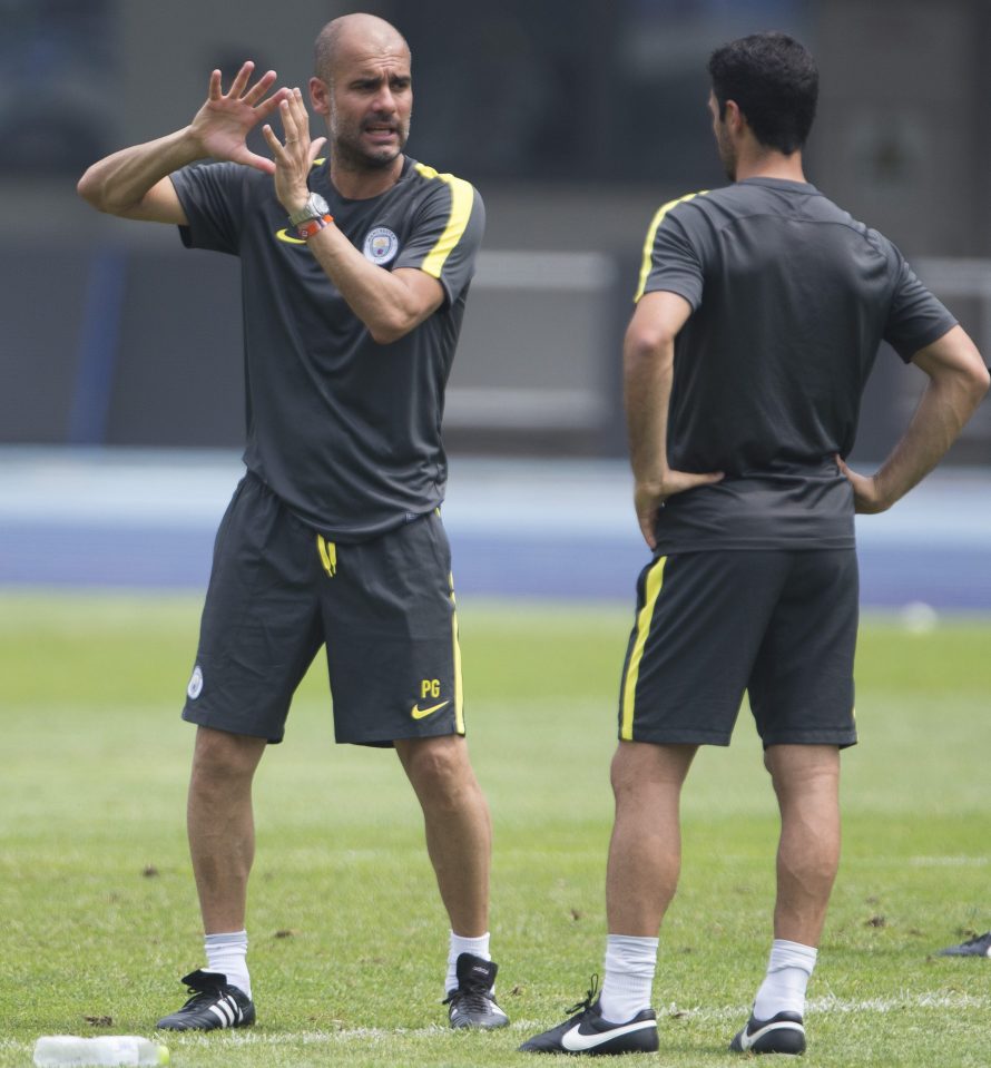 City boss pep Guardiola talks tactics with Arteta in Beijing