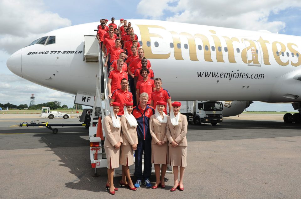 The Arsenal squad line up before boarding their plane to America