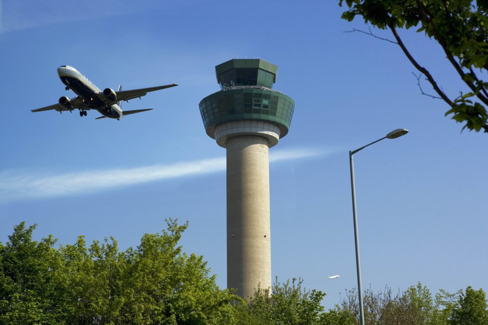 Plane ascending after take off passing the control tower at Stansted Airport (file photo)