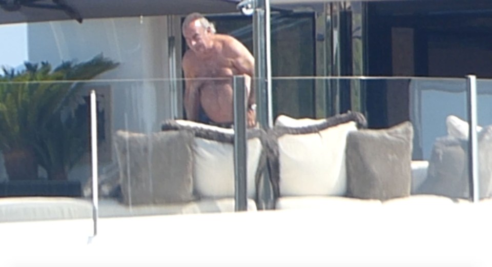 EXCLUSIVE: *PREMIUM EXCLUSIVE RATES - MINIMUM SET FEE TO BE AGREED* Sir Philip Green sunbathes aboard yacht
