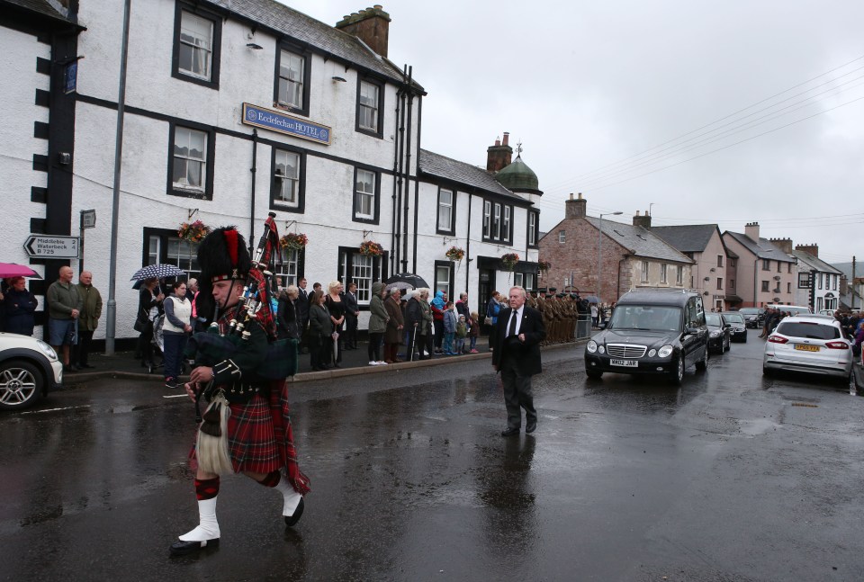 About 200 people, including many soldiers, attended the service