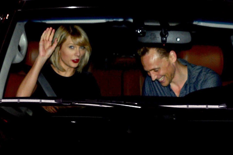 The couple appeared to get the giggles as they headed home in Tom's car