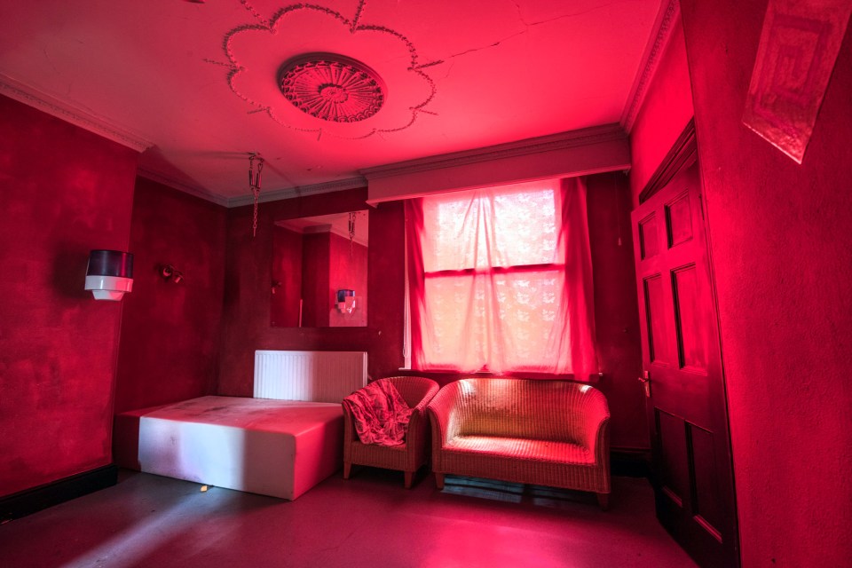 Seeing red ... abandoned room is ideal for scarlet women