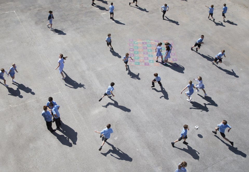 Children running in playground