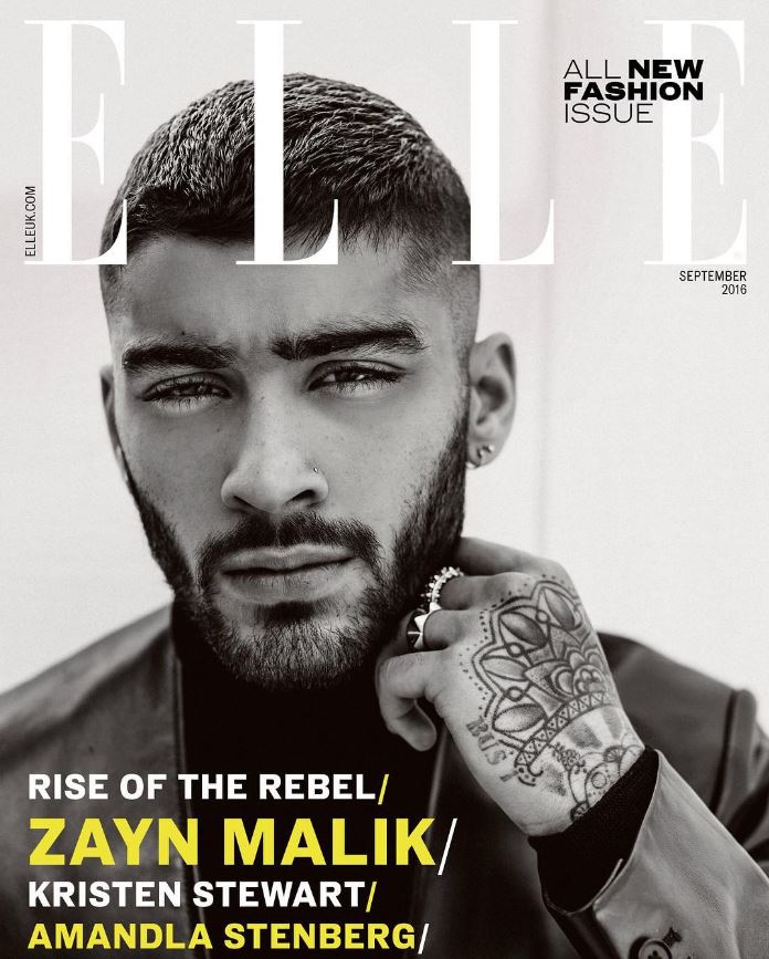 The star shows off his hand tattoo on Elle magazine's front cover