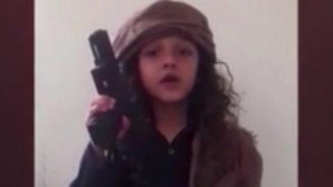 The ISIS propaganda video shows the little child reading from a script