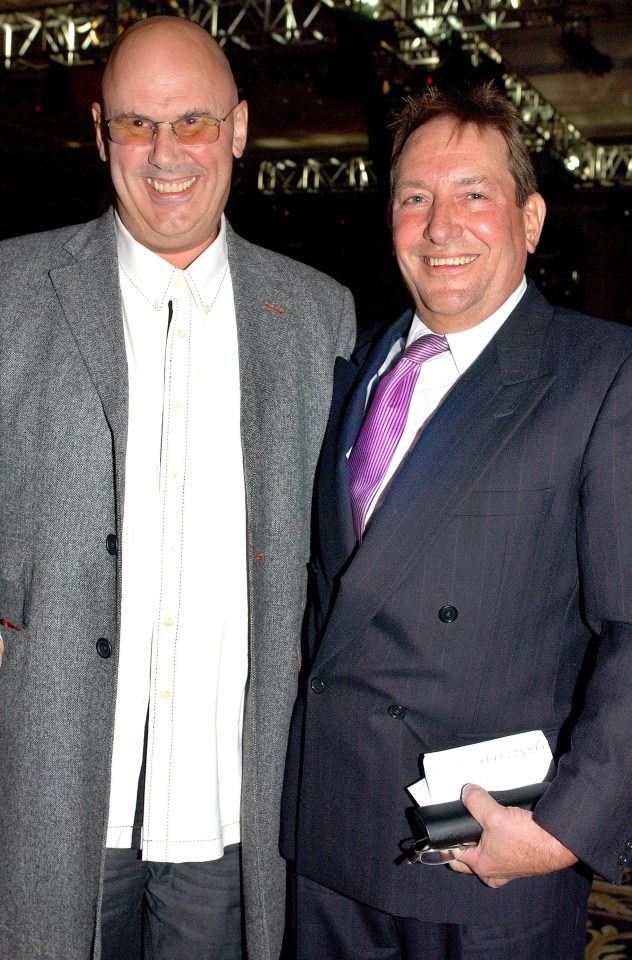 David, seen here with business partner Tim Clark, managed Robbie for 20 years