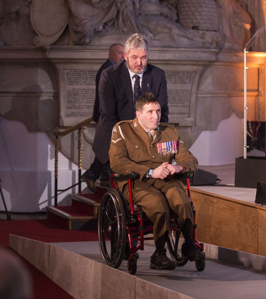 Ben Parkinson collects an award on behalf of the Pilgrim Bandits