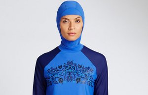 French resort of Cannes outlaws burkinis because they 'make women look like TERRORISTS'