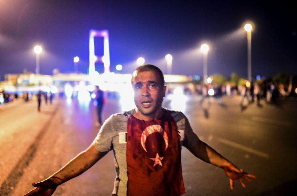 A man covered in blood was just one of the thousands who took to the streets against the military coup