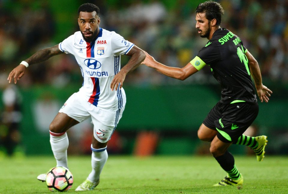 Lacazette tussles with Sporting's Bryan Ruiz