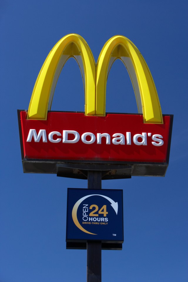golden arches sign at mcdonalds drive through fast food restaurant merseyside england uk