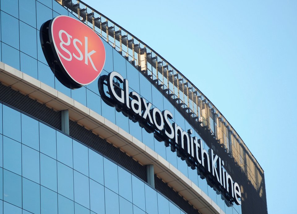 of a GlaxoSmithKline logo outside one of its buildings in west London
