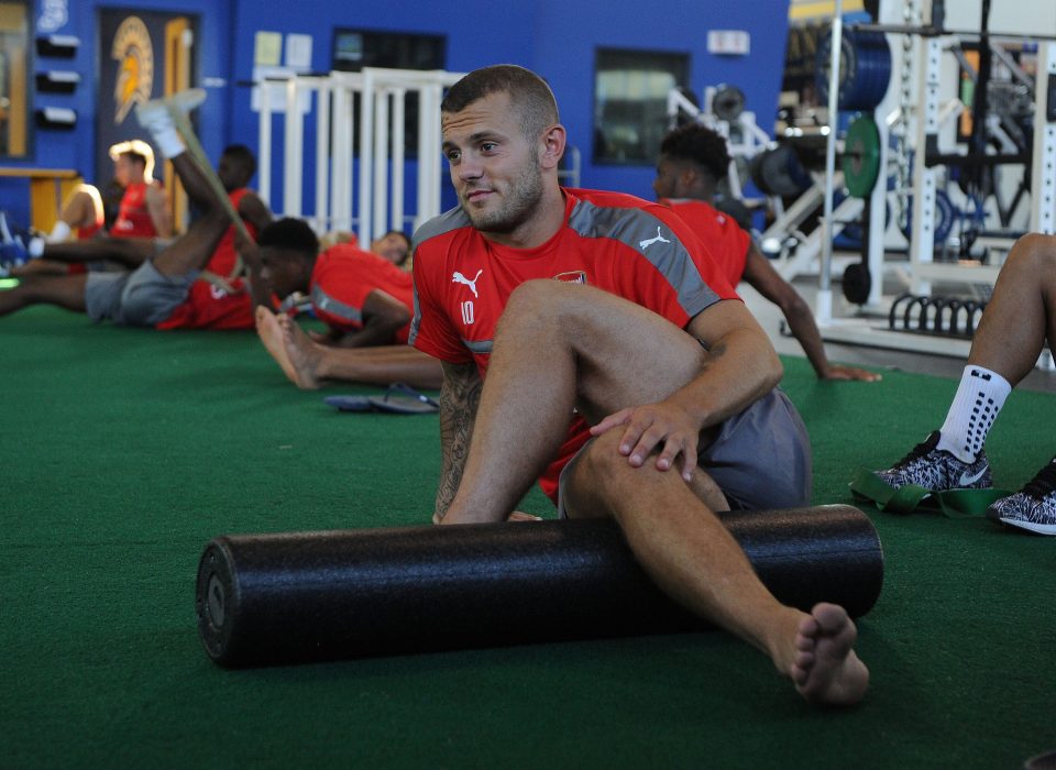 Jack Wilshere uses a foam roller during Arsenal's pre-season training camp in San Jose