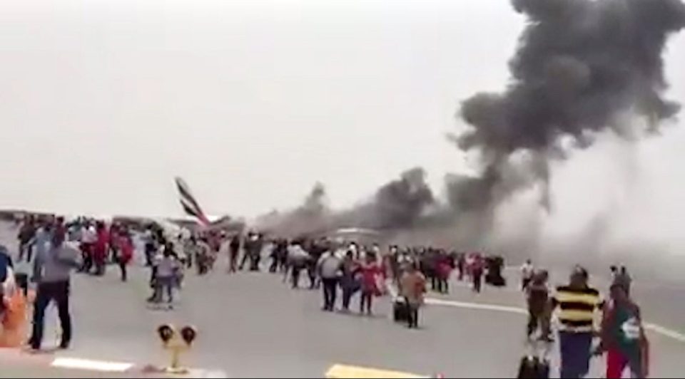 Footage caught the moment passengers fled the burning aircraft on the runway at Dubai International Airport