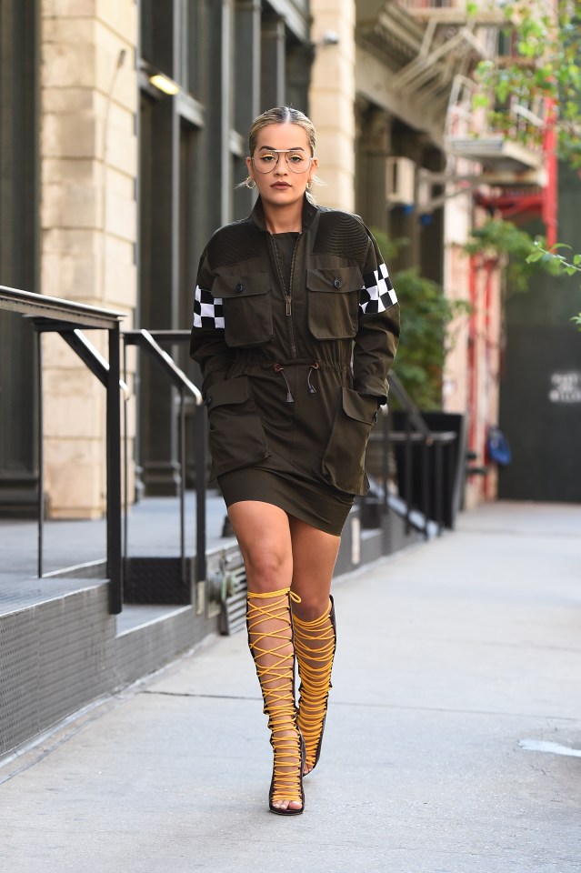Rita wore a pitstop inspired mini dress and some knee-high sandals