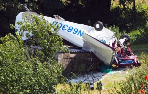 Three people including a child are injured after a private jet crashes near Weymouth
