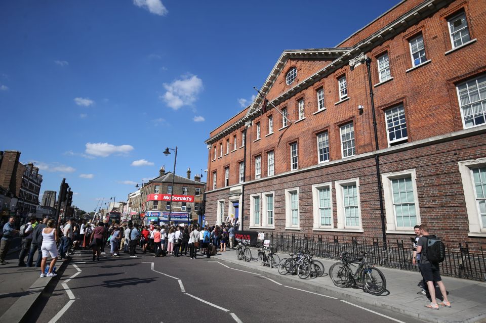Protesters at Tottenham police station in London after marching from Broadwater Farm to mark the fifth anniversary of the death of Mark Duggan