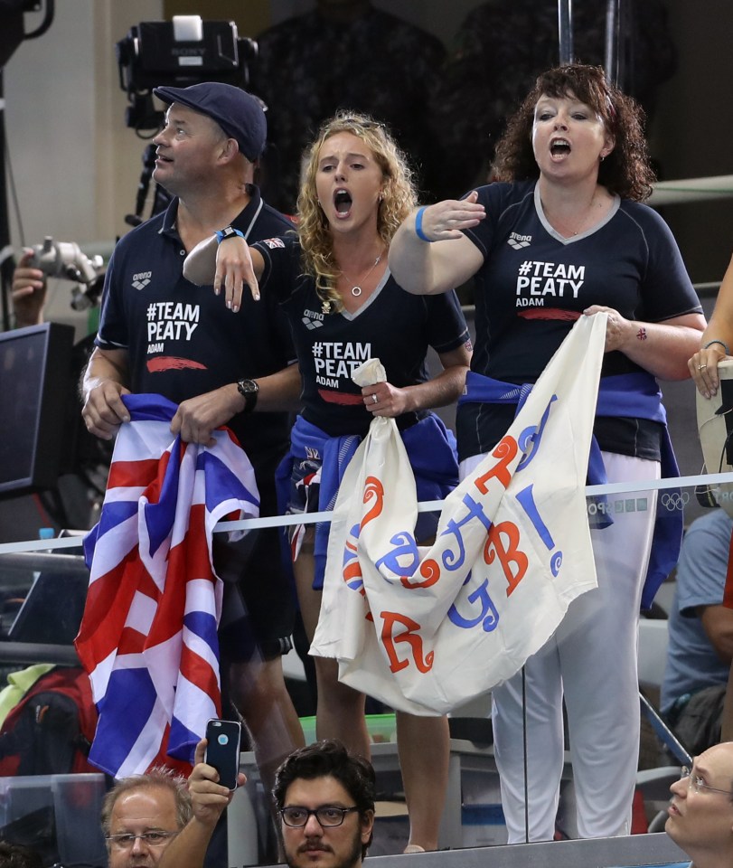 Dad Mark, mum Caroline and girlfriend Anna Zair cheer on Adam from the crowd