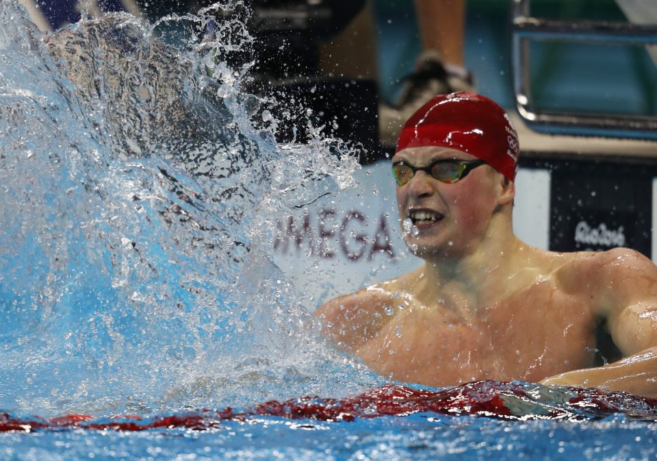 Peaty turns to look at the clock after finishing in the Olympic 100m breaststroke final 