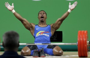 Colombian weightlifter Oscar Figueroa bursts into tears after winning gold in 62kg class