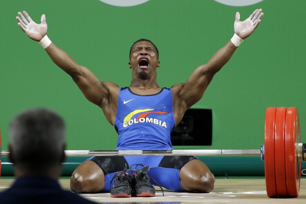 Oscar Figueroa slumps to the ground following incredible, winning lift of 318kg