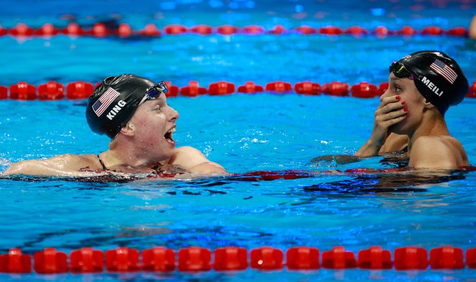 King celebrates winning gold with USA team-mate Katie Meili 