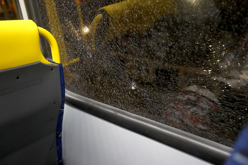 The bus was left damaged as it travelled from the basketball arena to the Olympic park