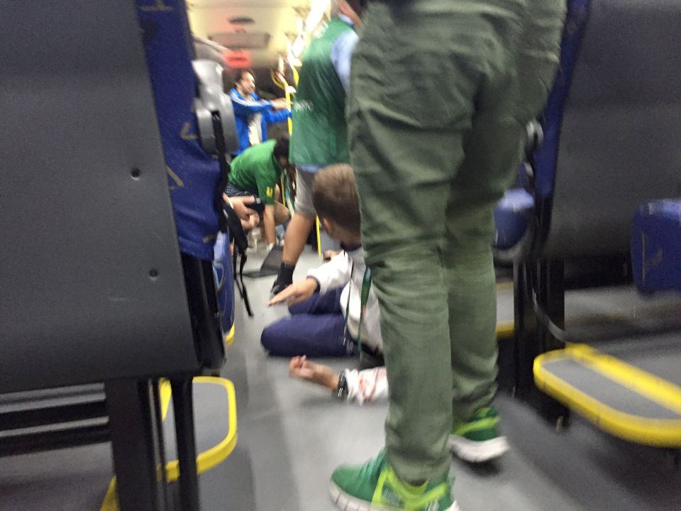 Passengers duck for cover as the bus came under fire on Tuesday
