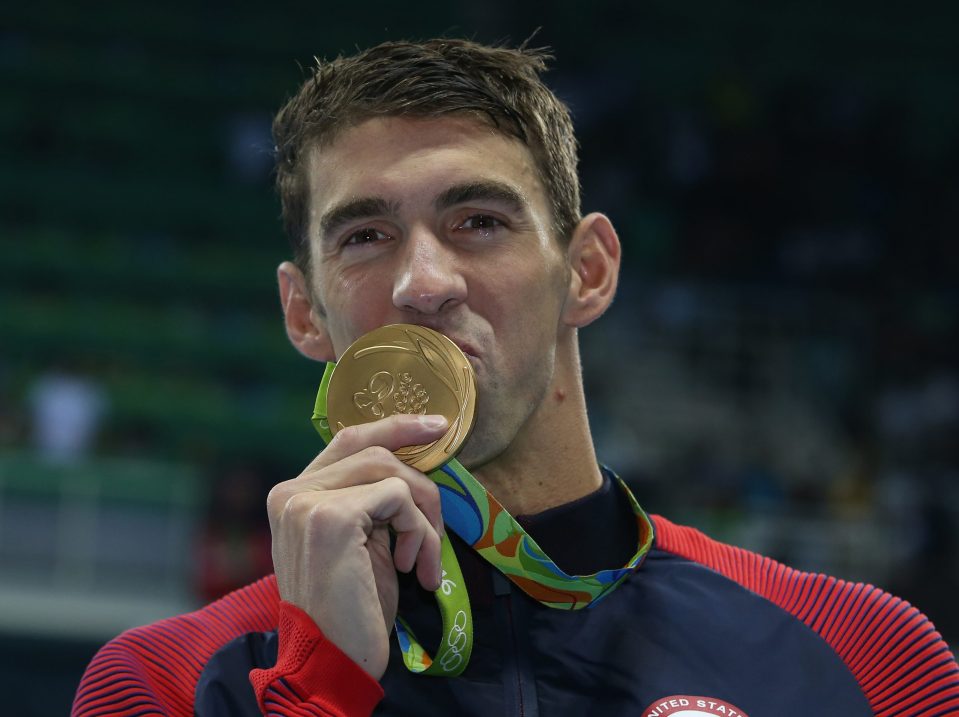 Michael Phelps won two gold medals to bring his total tally to 21