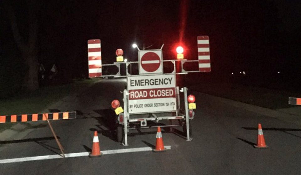 Police told neighbours to stay indoors when a man was shot after detonating an explosive device