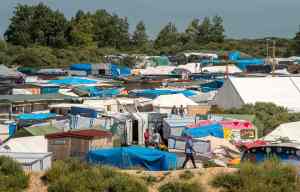 Police fear terrorists poised to attack UK are hiding among 7,000 migrants in Calais camp