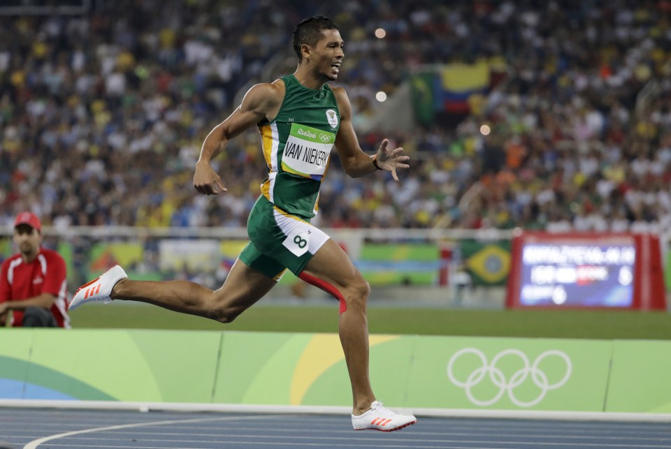South Africa's Wayde Van Niekerk crosses the finish line to win the men's 400m final 