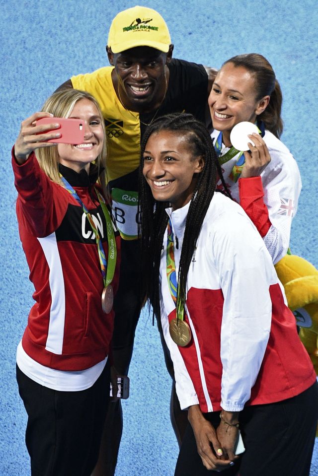 Jamaica's Usain Bolt (Top) poses with fe
