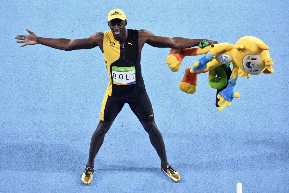 Jamaica's Usain Bolt celebrates after he