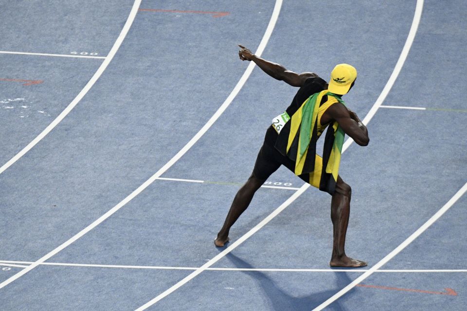 Jamaica's Usain Bolt celebrates after he