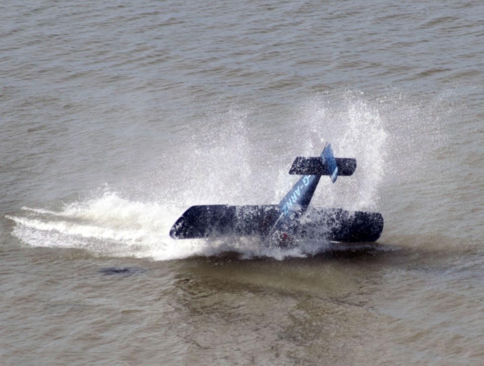 Shocking pictures reveal the moment a plane crashed into the sea after the pilot lost control mid air