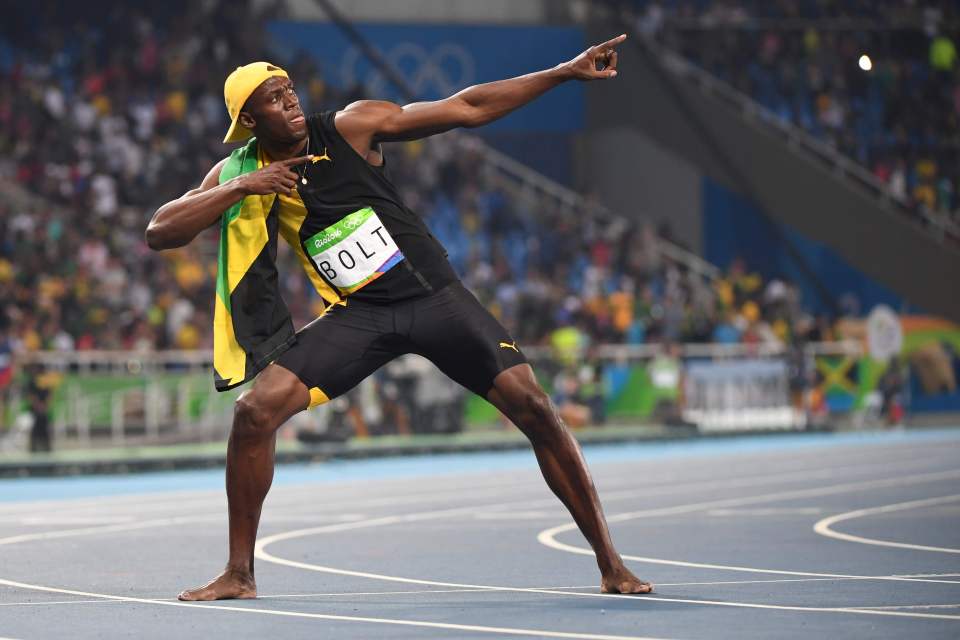 Usain Bolt does his 'Lightening Bolt' pose as he celebrates winning the Men's 100m Final at the Rio 2016 Olympics