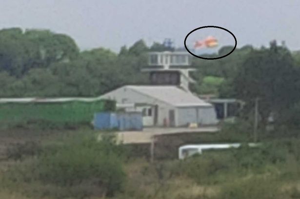The pilot, 67, suffered a broken leg during the crash in Salford, Greater Manchester