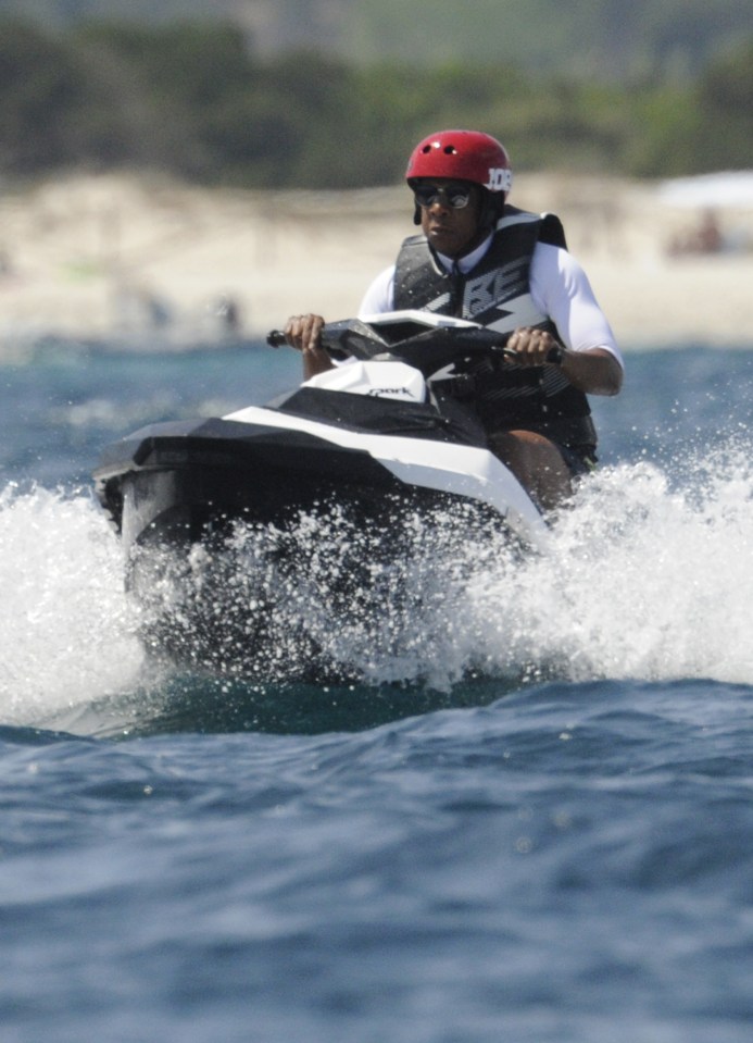 Jay looks less than thrilled on a jet-ski ride
