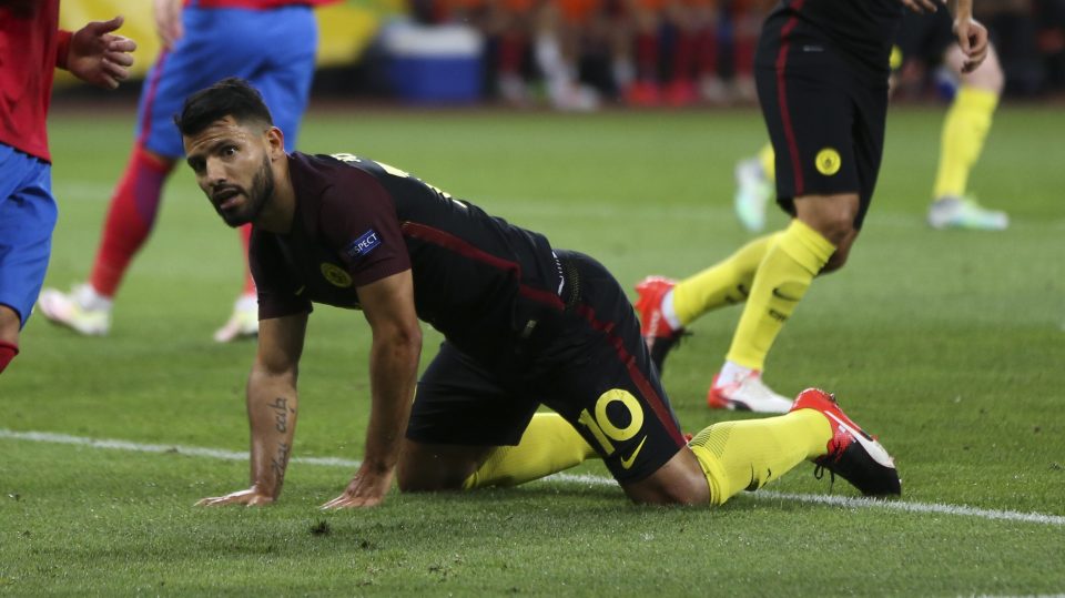 Aguero watches his penalty fly over the bar