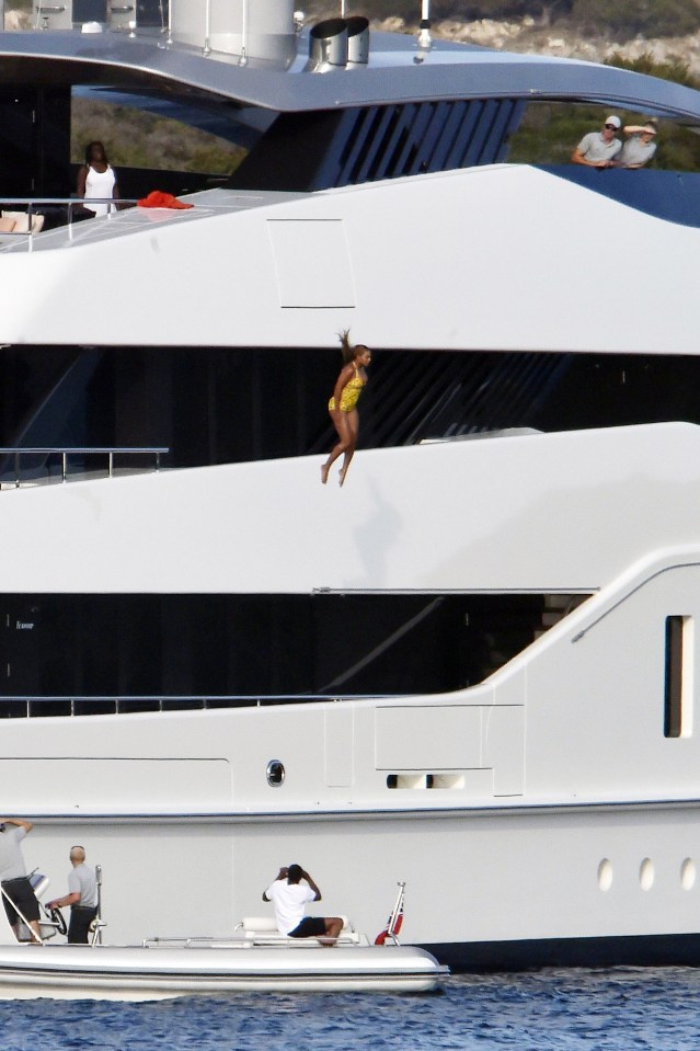 Beyonce took the plunge by jumping off a giant yacht