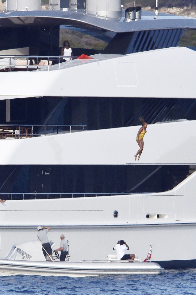 Photographers gathered on a boat nearby to capture the moment