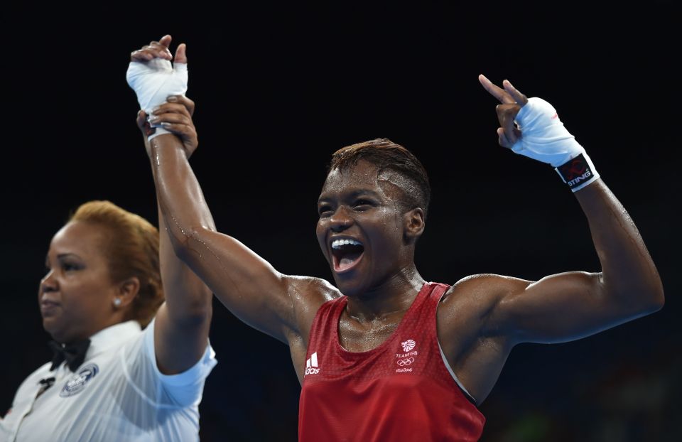 Nicola Adams celebrates after progressing through to Saturdays final