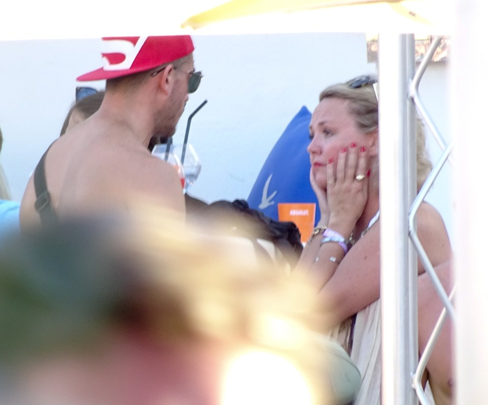 EXCLUSIVE ALL ROUND PICTURES 300 ONLINE USE OR STANDARD RATES PER PRINT Charlie Brooks seen chating to a mystery man while at a pool party in Ibiza this afternoon, At one stage the conversation seemed to get a bit heated but then went off alone for a