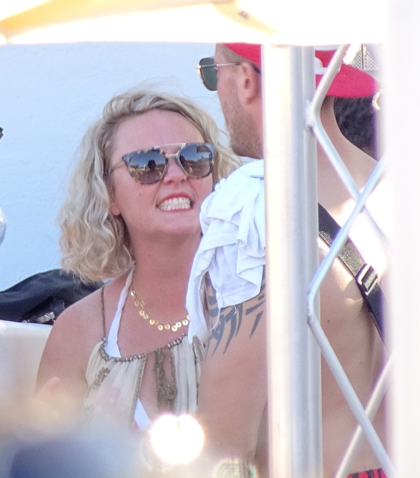 EXCLUSIVE ALL ROUND PICTURES 300 ONLINE USE OR STANDARD RATES PER PRINT Charlie Brooks seen chating to a mystery man while at a pool party in Ibiza this afternoon, At one stage the conversation seemed to get a bit heated but then went off alone for a