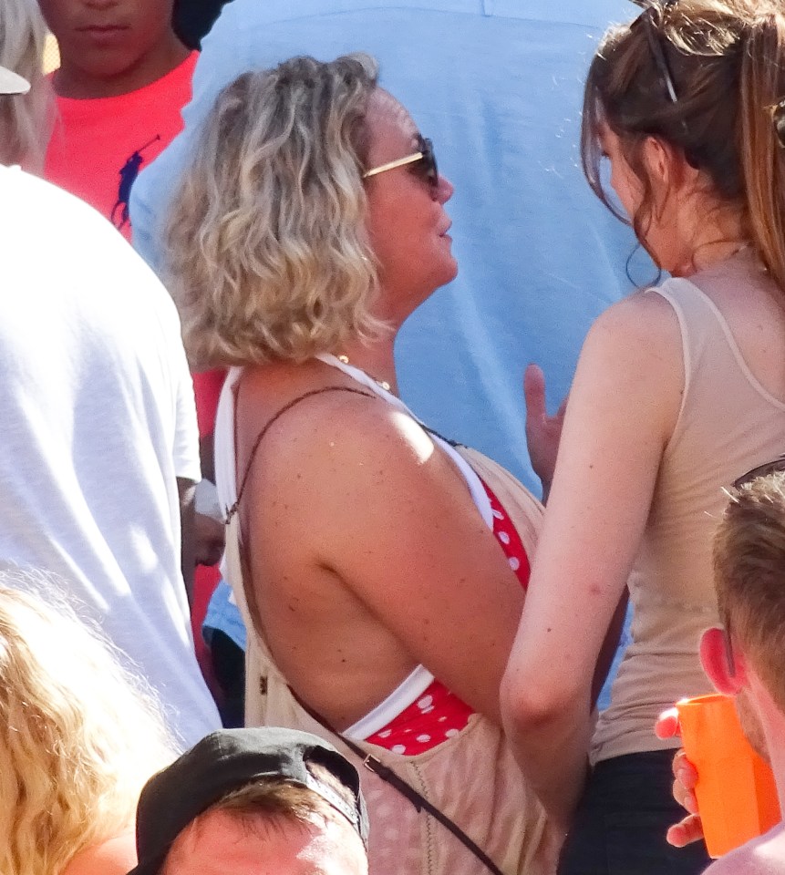 EXCLUSIVE ALL ROUND PICTURES 300 ONLINE USE OR STANDARD RATES PER PRINT Charlie Brooks seen chating to a mystery man while at a pool party in Ibiza this afternoon, At one stage the conversation seemed to get a bit heated but then went off alone for a